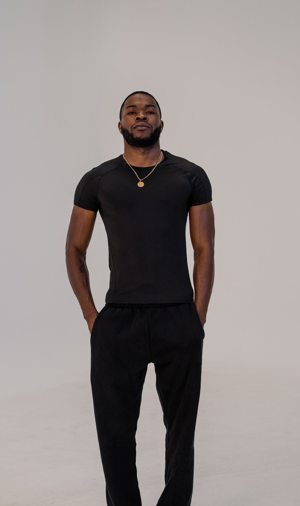 ESSENTIALS COMPRESSION SHORT SLEEVE