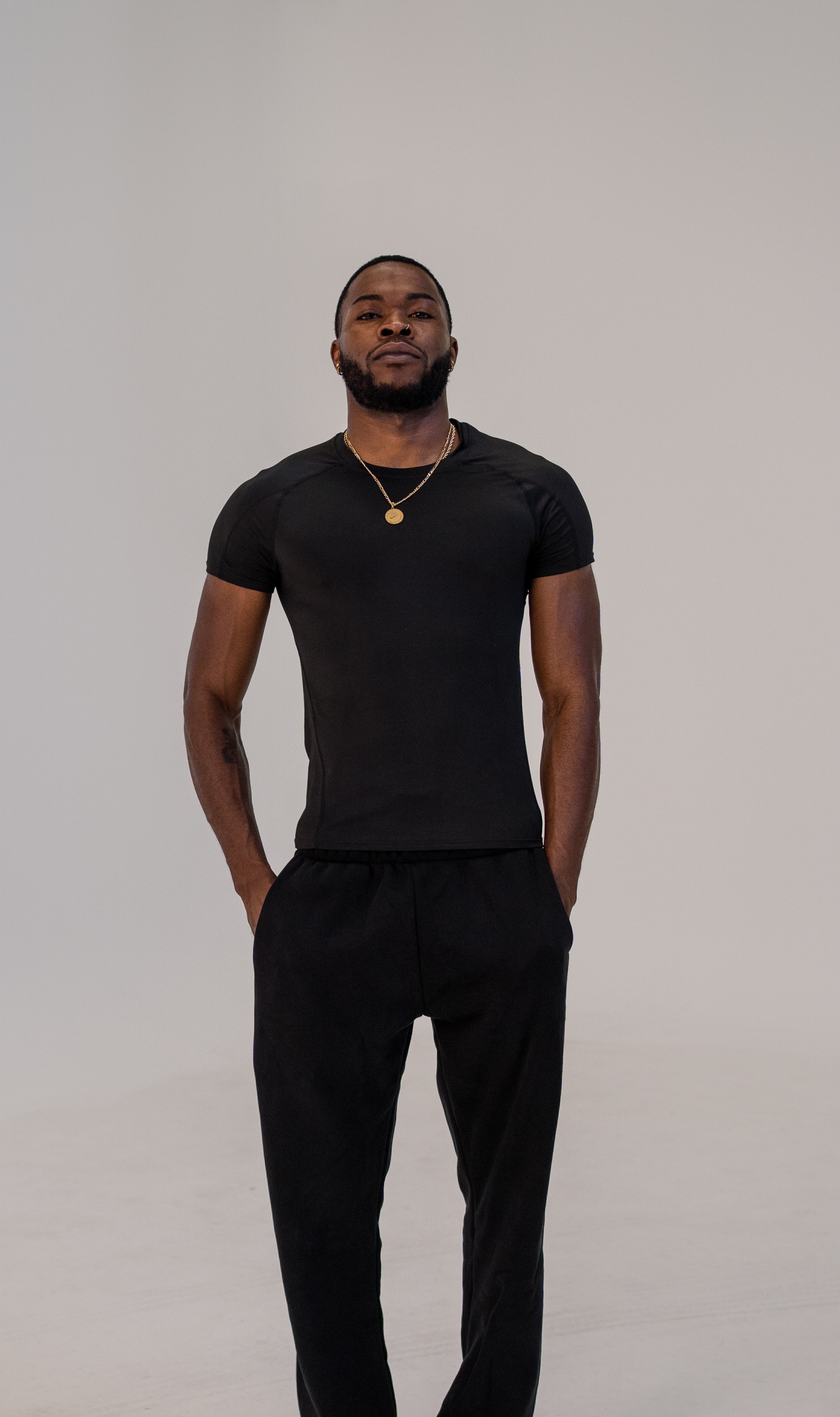 ESSENTIALS COMPRESSION SHORT SLEEVE